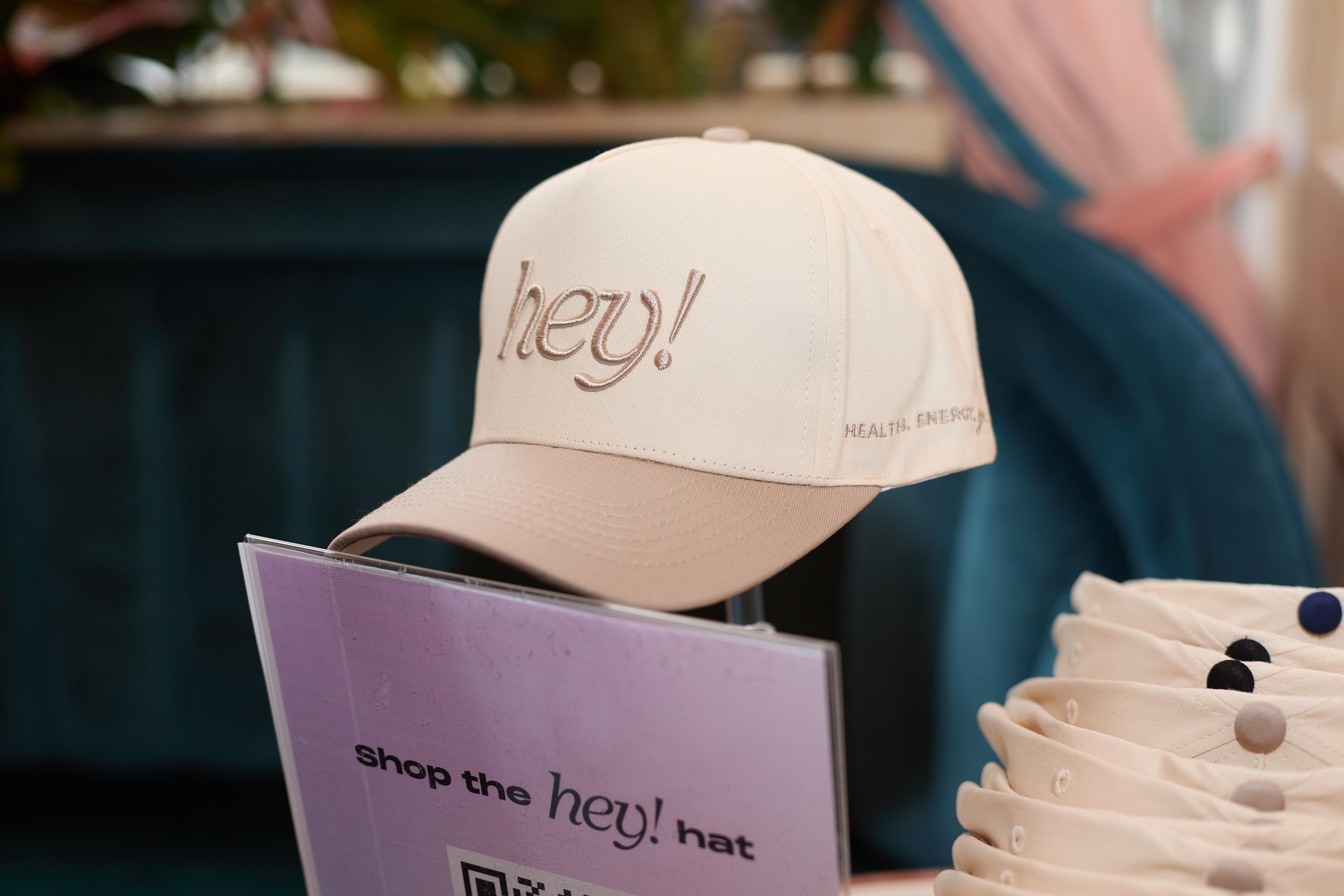 hey hat in beige on a hat stand