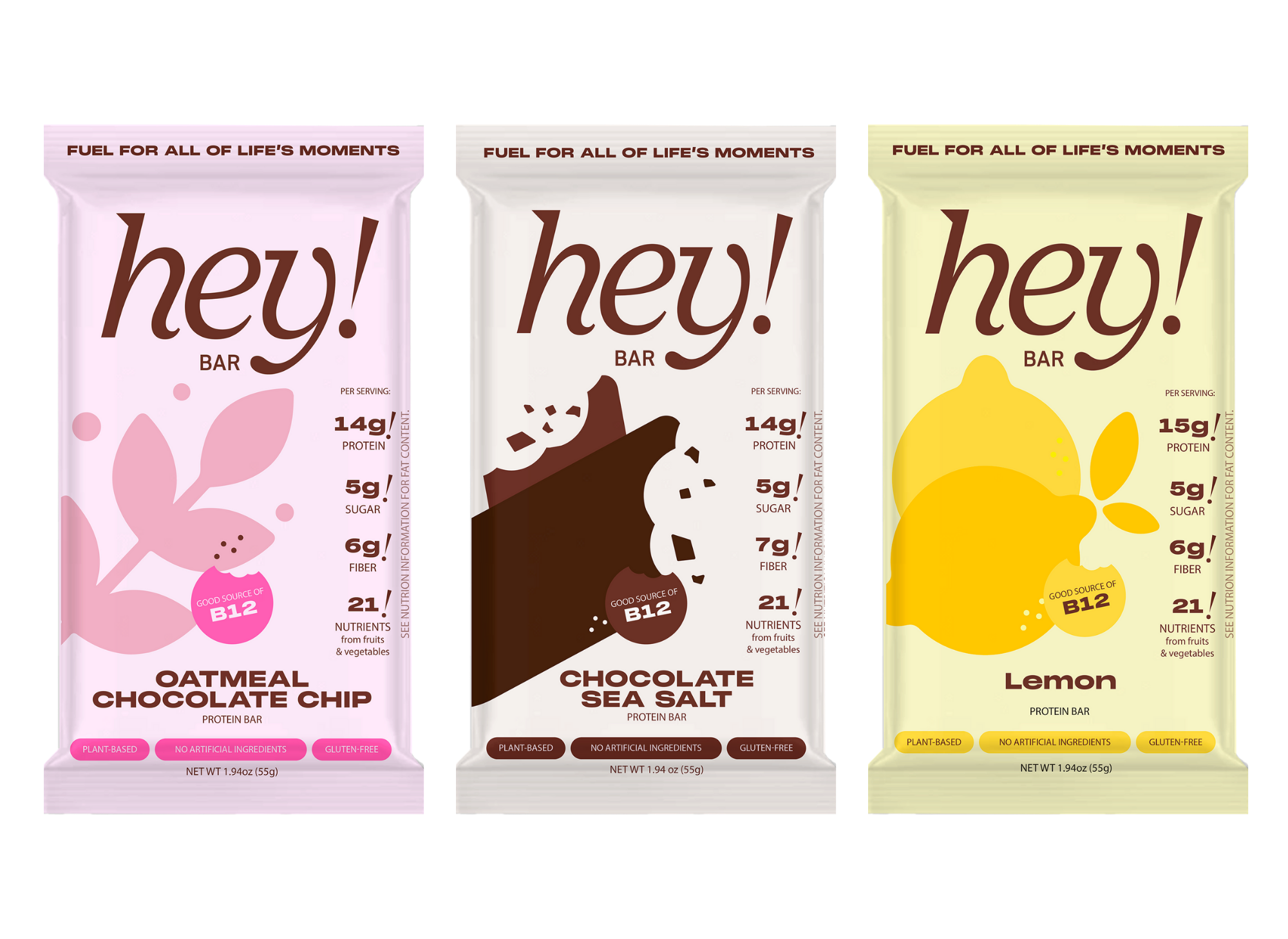 Three HEY! BAR wrappers side by side—Oatmeal Chocolate Chip (pink), Chocolate Sea Salt (cream with brown graphic), and Lemon (pale yellow with lemon graphic)—showing “hey!” branding and front-of-pack nutrition callouts (protein, sugar, fiber, and B12).
