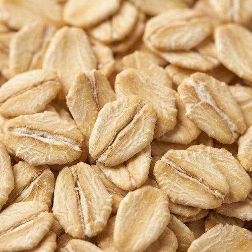 Close-up of a pile of uncooked rolled oats